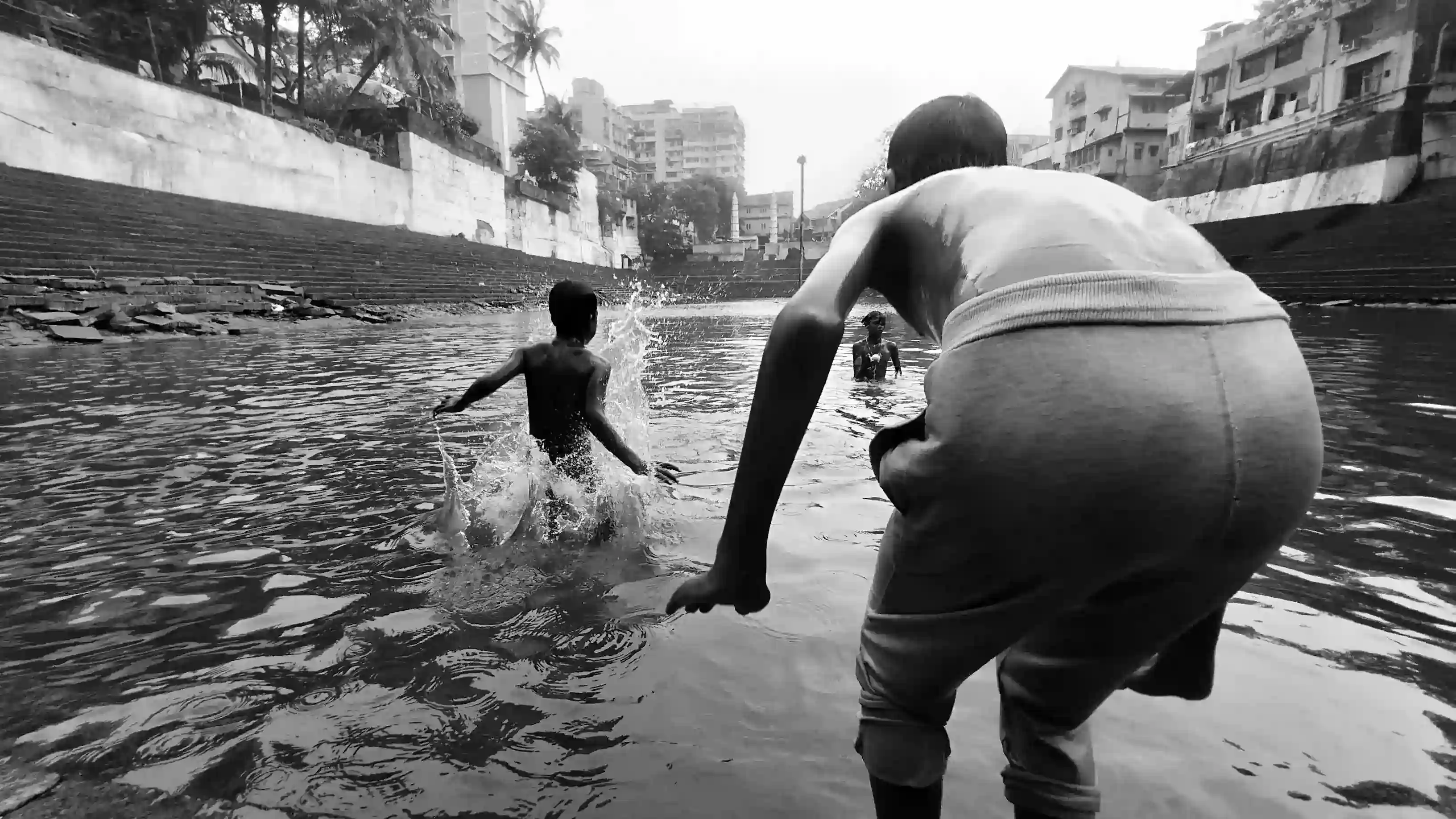 Children playing near Banganga